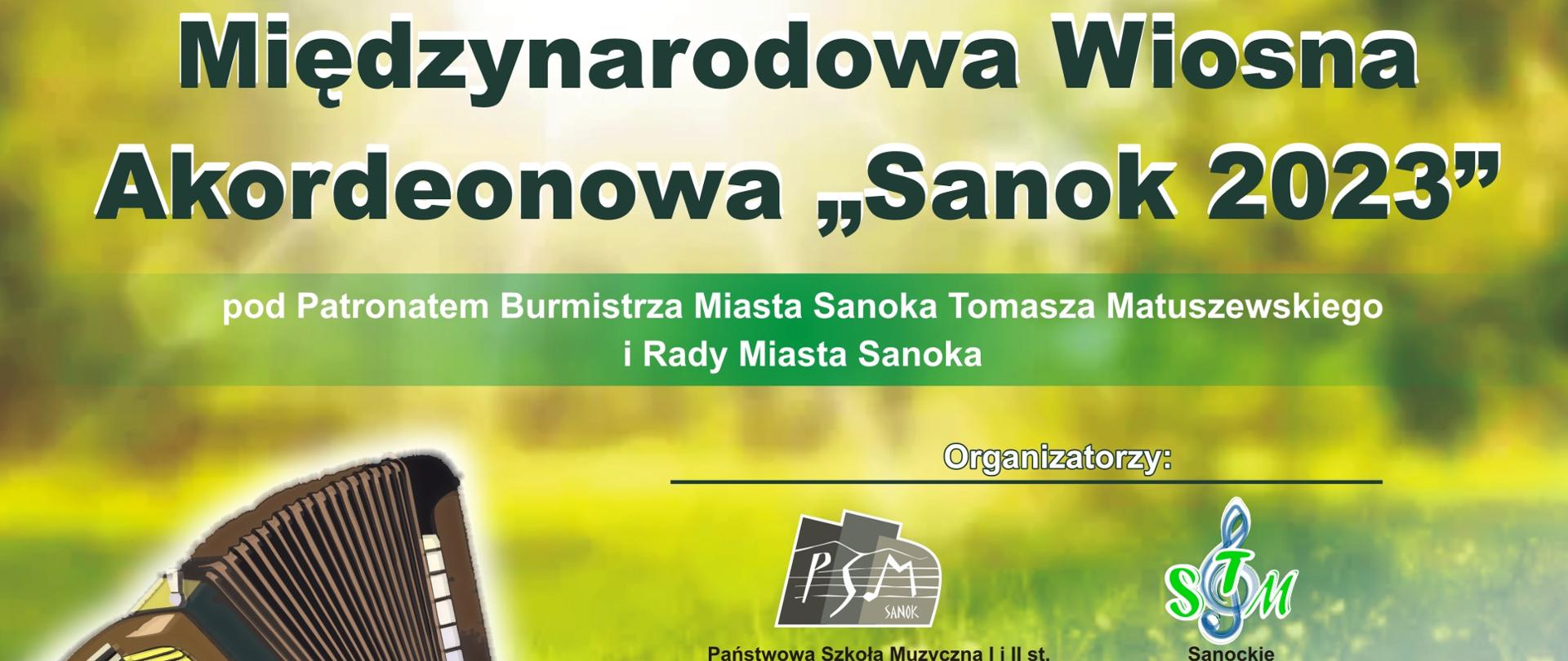 Baner międzynarodowej wiosny akordeonowej sanok 2023. Akordeon, w tle zielona łąka, białe i czarne litery