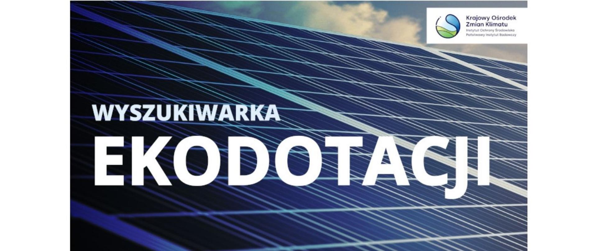 Wielki biały napis: Wyszukiwarka Ekodotacji na tle paneli fotowoltaicznych, w prawym górnym rogu logo Krajowego Ośrodka Zmian Klimatu 