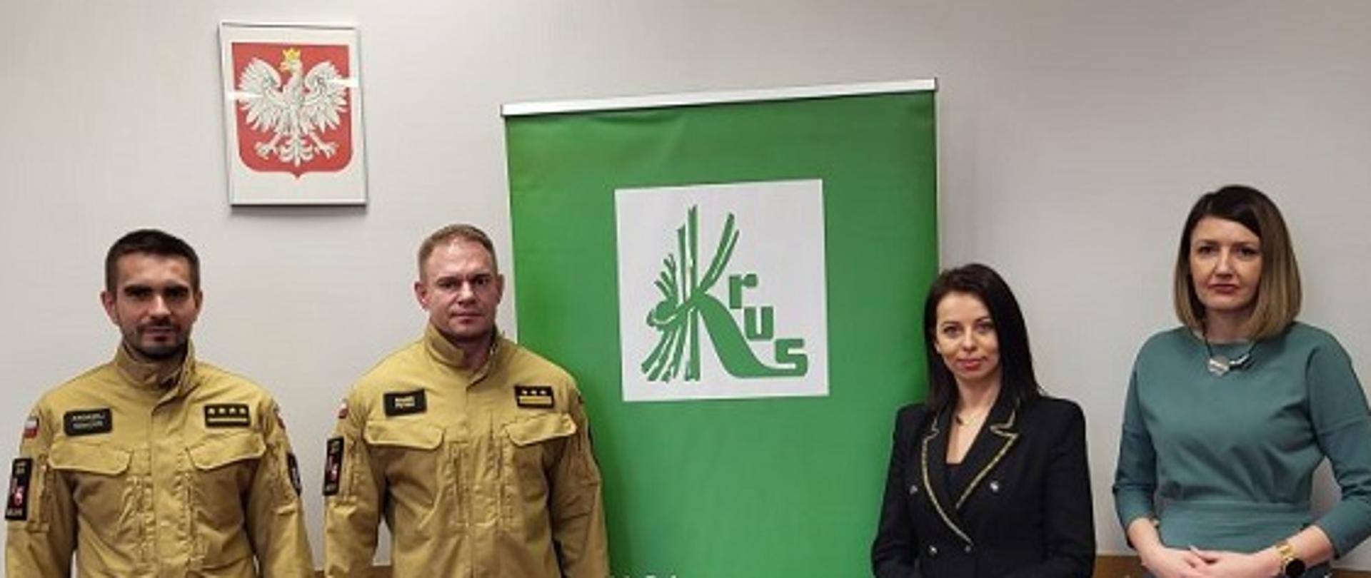 Przedstawiciele KRUS i PSP na tle baneru KRUS