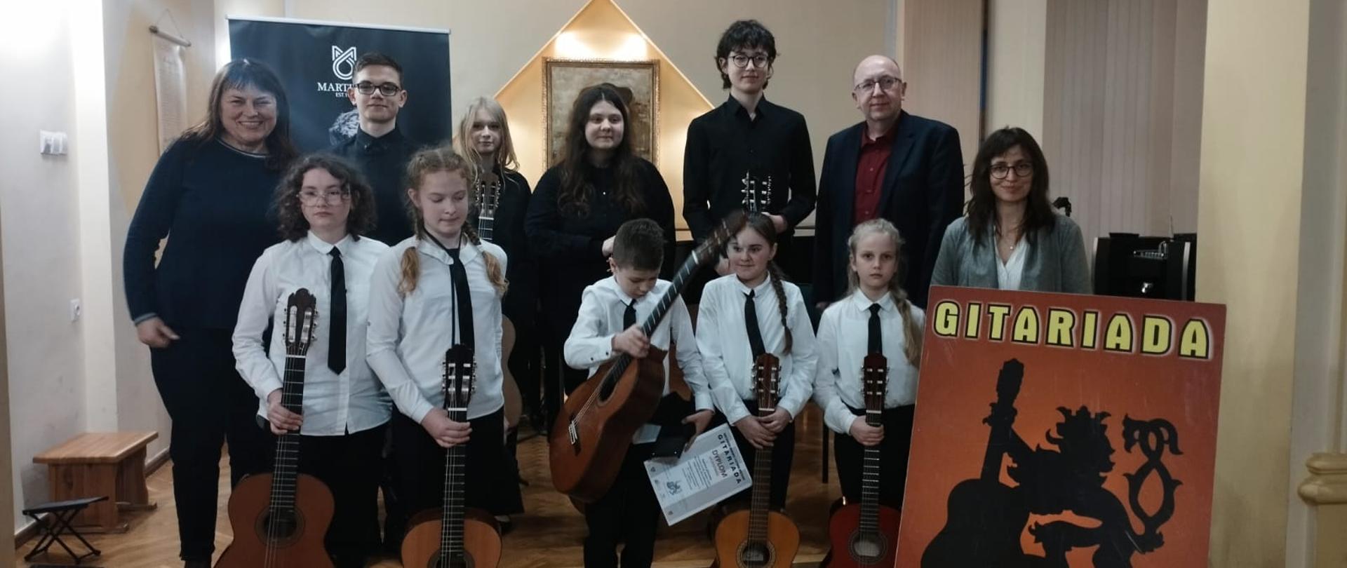 uczniowie biorący udział w Konkursie Gitarowym - Gitariada 14.04.2023 r. 