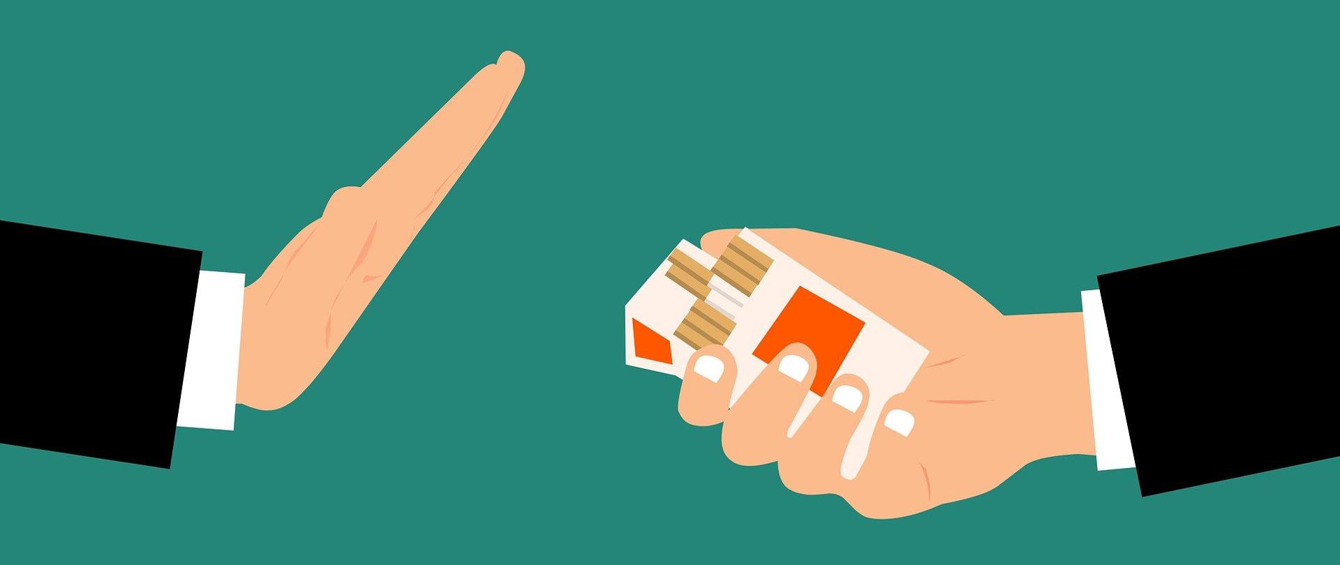 Dłonie na zielonym tle