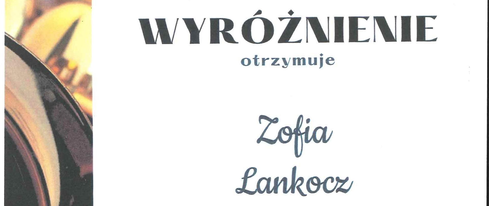 Wyróżnienie dla Zofii Lankocz w formie dyplomu dane laureatki nazwa i data konkursu w tle zdjęcie instrumentu dętego prawdopodobnie saksofonu.