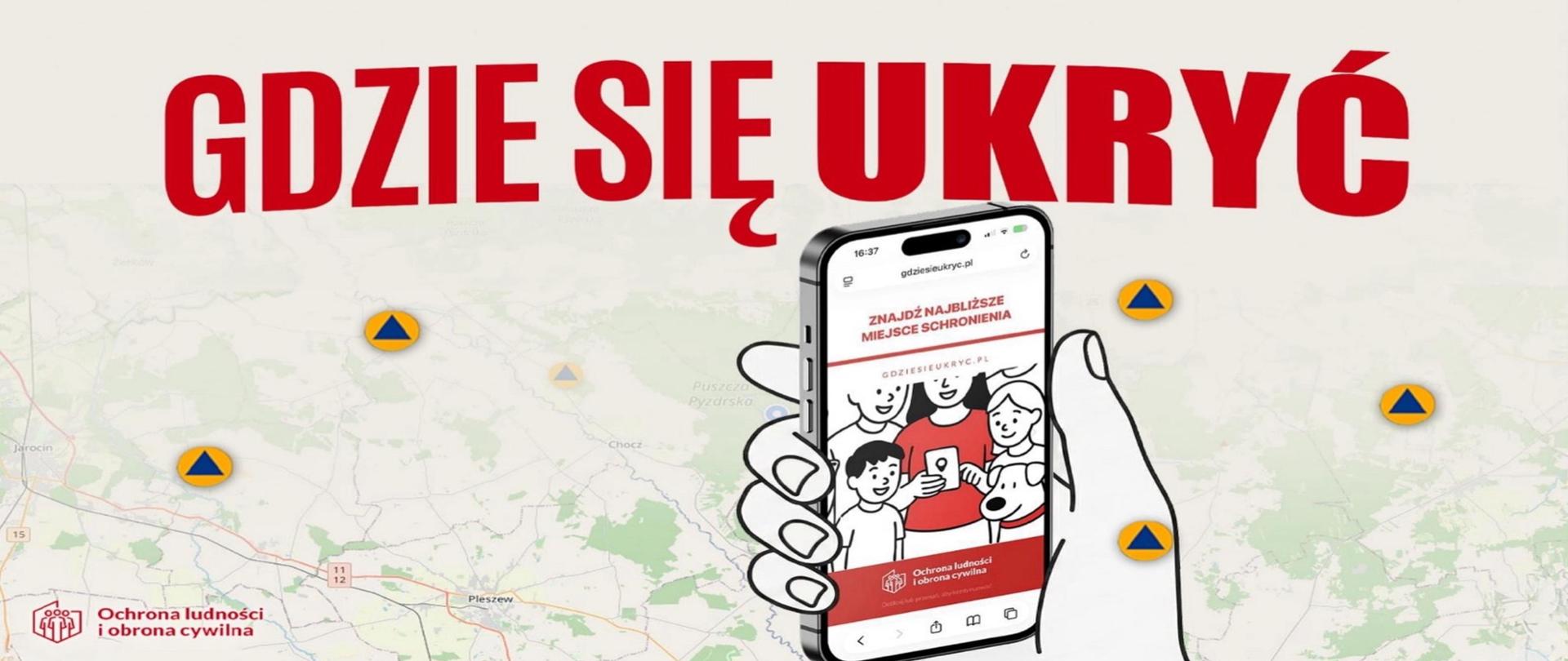Plakat promocyjny nowej aplikacji rządowej „Gdzie się ukryć” pokazuje rękę trzymającą smartfon z otwartą mapą aplikacji. Na mapie Polski zaznaczono żółte pinezki wskazujące punkty schronienia, w tle zielone obszary lądu. Logo Państwowej Straży Pożarnej w prawym dolnym rogu.