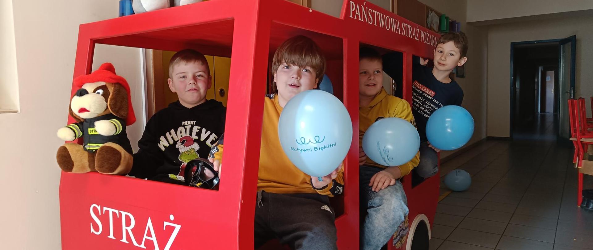 Wizyta uczniów Szkoły Podstawowej w Borku w salce OGNIK Komendy Miejskiej PSP w Poznaniu - Domek Zagrożeń