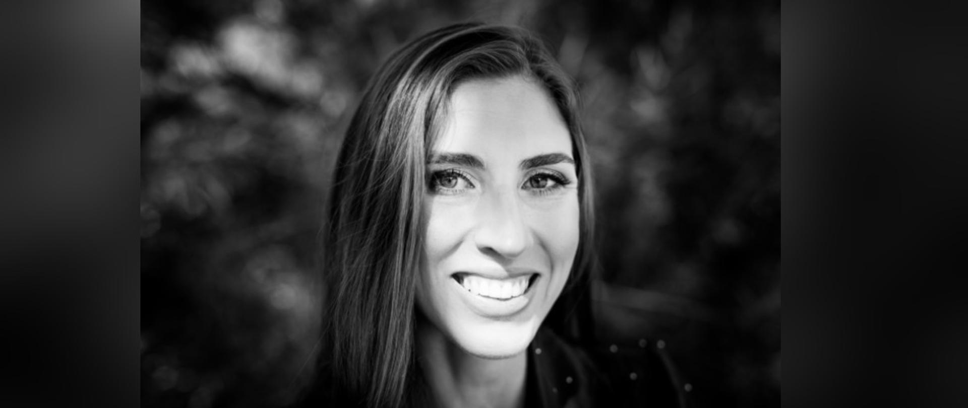 Black and white picture of smiling woman
