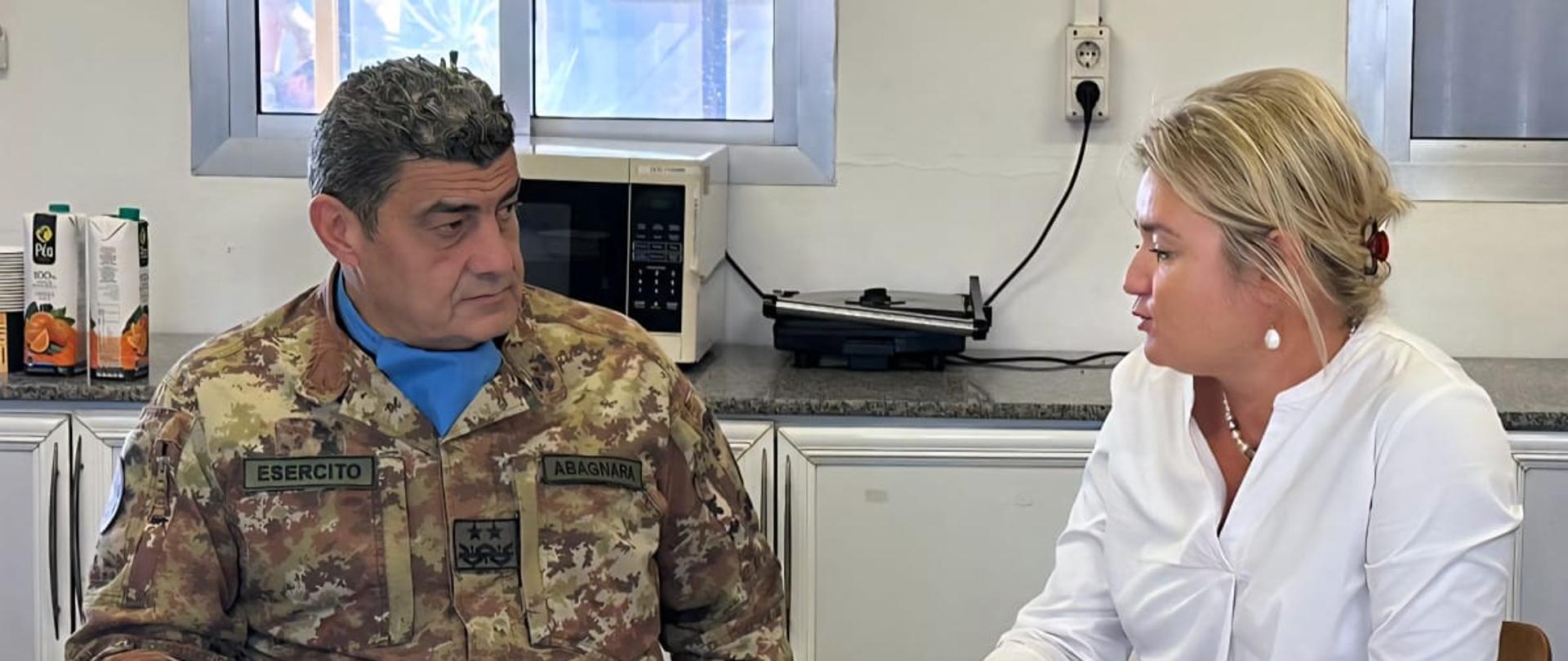 gen. D. Abagnara and Polish Ambassador - A. Bukowska-McCabe at UNP 6-50 - sitting by the table and discussing 