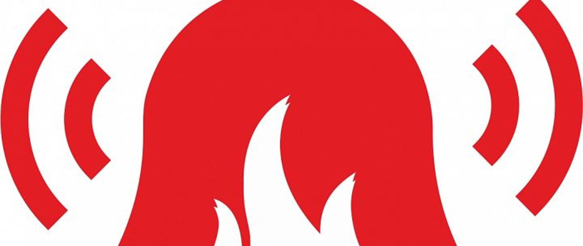 na białym tle czerwony dzwonek. W środku dzwonka zarys płomienia. Ilustracja nawiązuje do alarmowania podczas pożaru. 