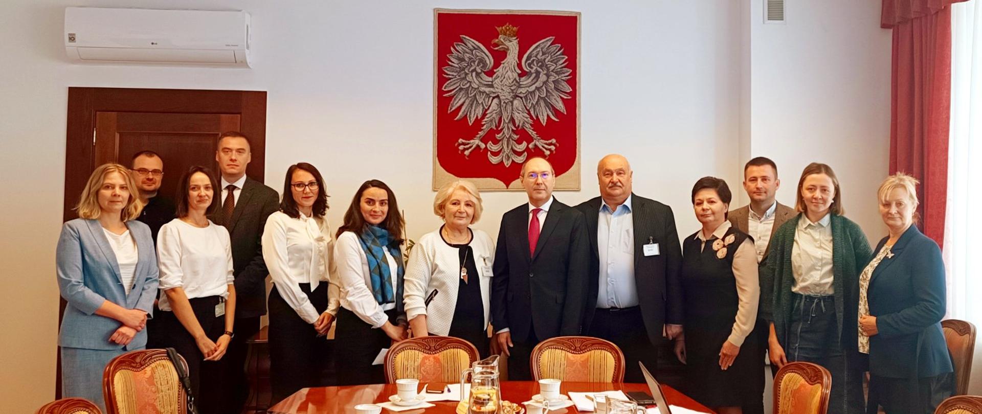 Representative of the Moldavian Embassy in Poland Gheorghe Soltan, representative of the Ministry of Foreign Affairs - Wojciech Gołębiowski with representatives of GUGiK and a delegation from Moldova.