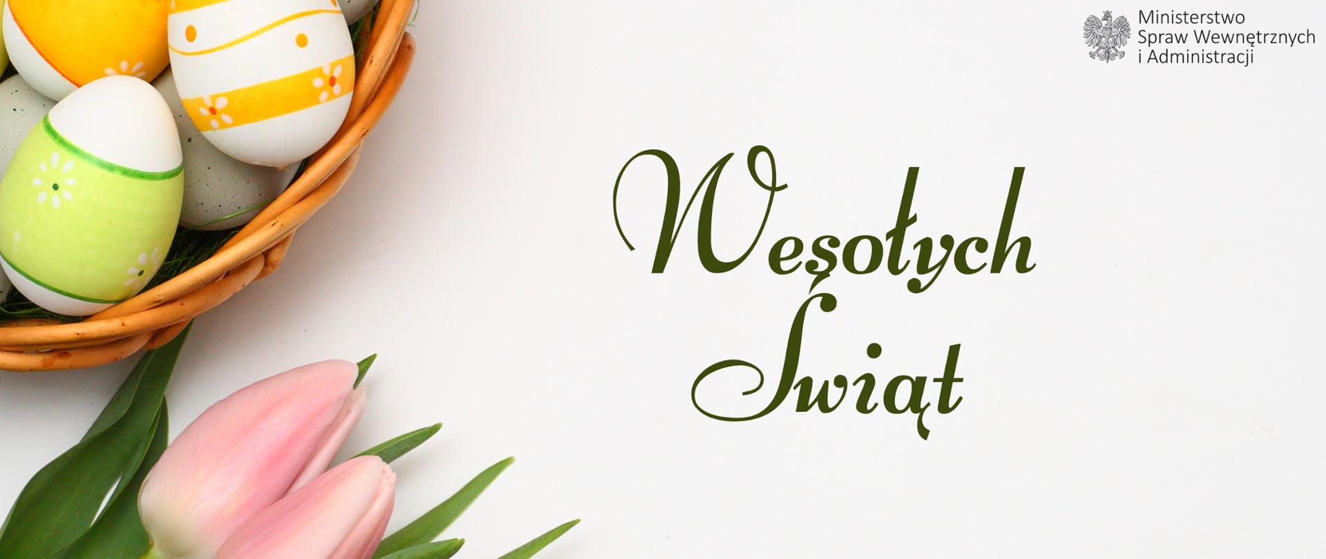 Baner - w lewym dolnym rogu tulipany różowe, nad nimi widoczny skrawek koszyczka z jajkami, po prawo napis Wesołych Świąt , w prawym górnym rogu logo MSWiA