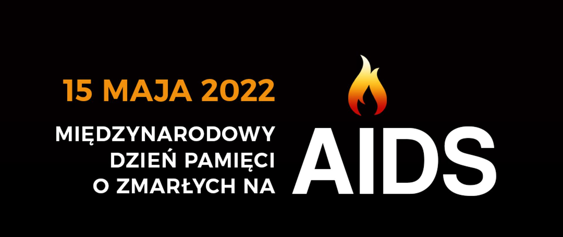 Czarny baner z napisem 15 maja 2022 - Międzynarodowy Dzień Pamięci o Zmarłych na AIDS. Poniżej zapalone świeczki