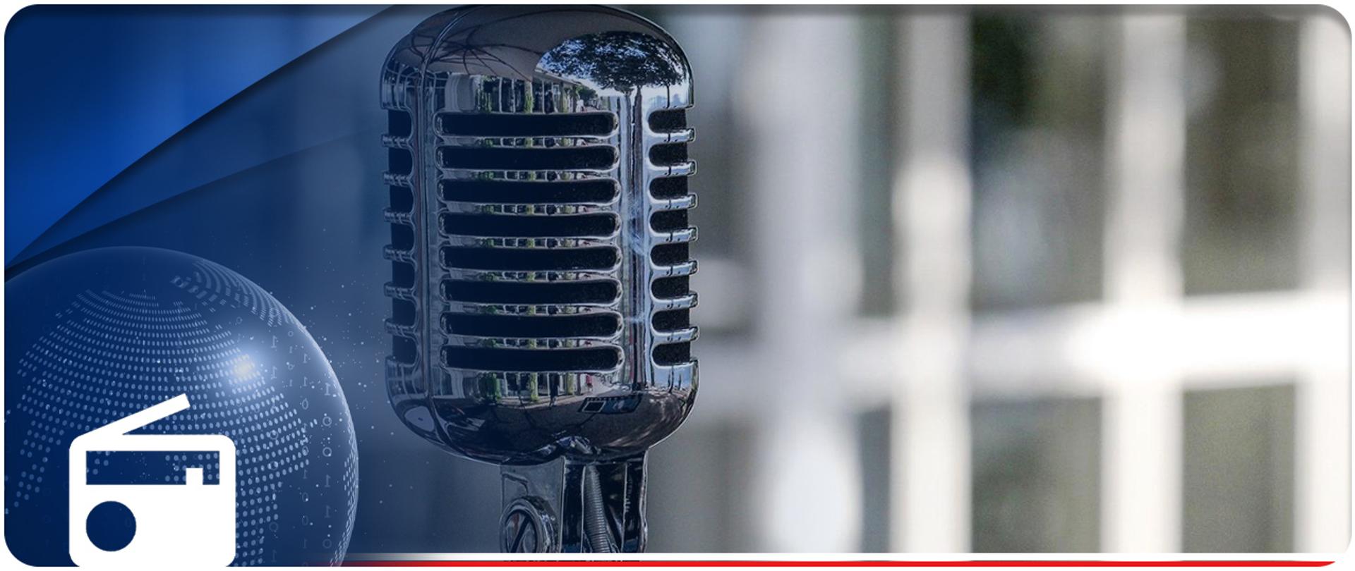 Wicepremier w mediach. Na zdjęciu mikrofon.