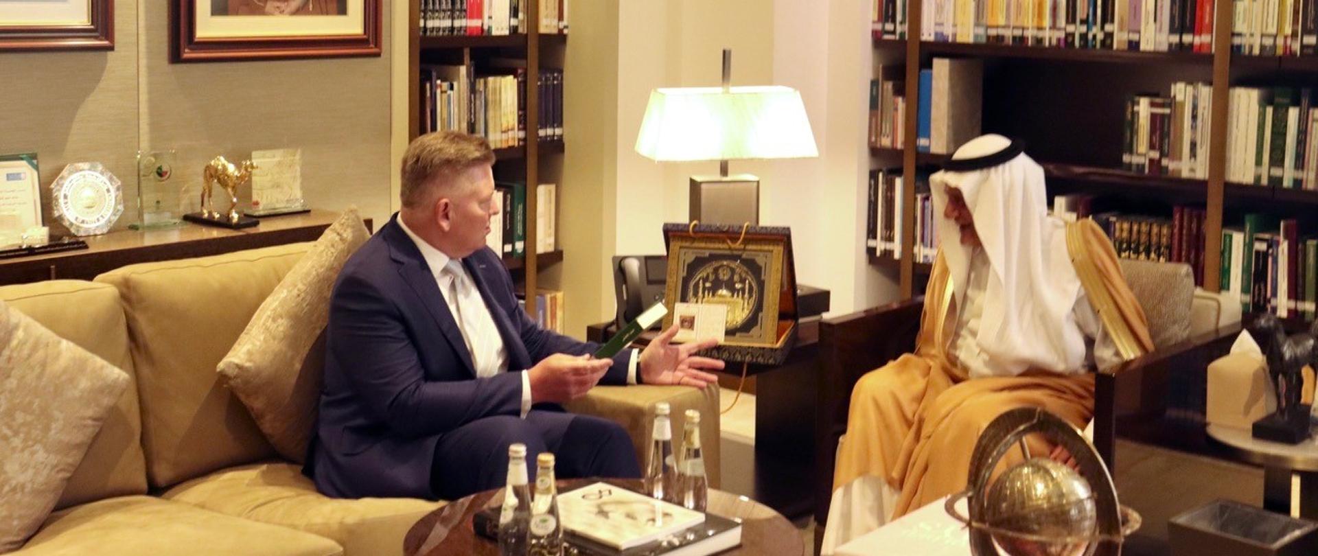 Ambassador of the Republic of Poland Robert Rostek (left) in conversation with His Royal Highness Prince Turki Al-Faisal, Chairman of the Board of Directors of the King Faisal Center for Research and Islamic Studies.