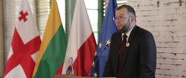 Minister Grzegorz Puda podczas wystąpienia na konferencji