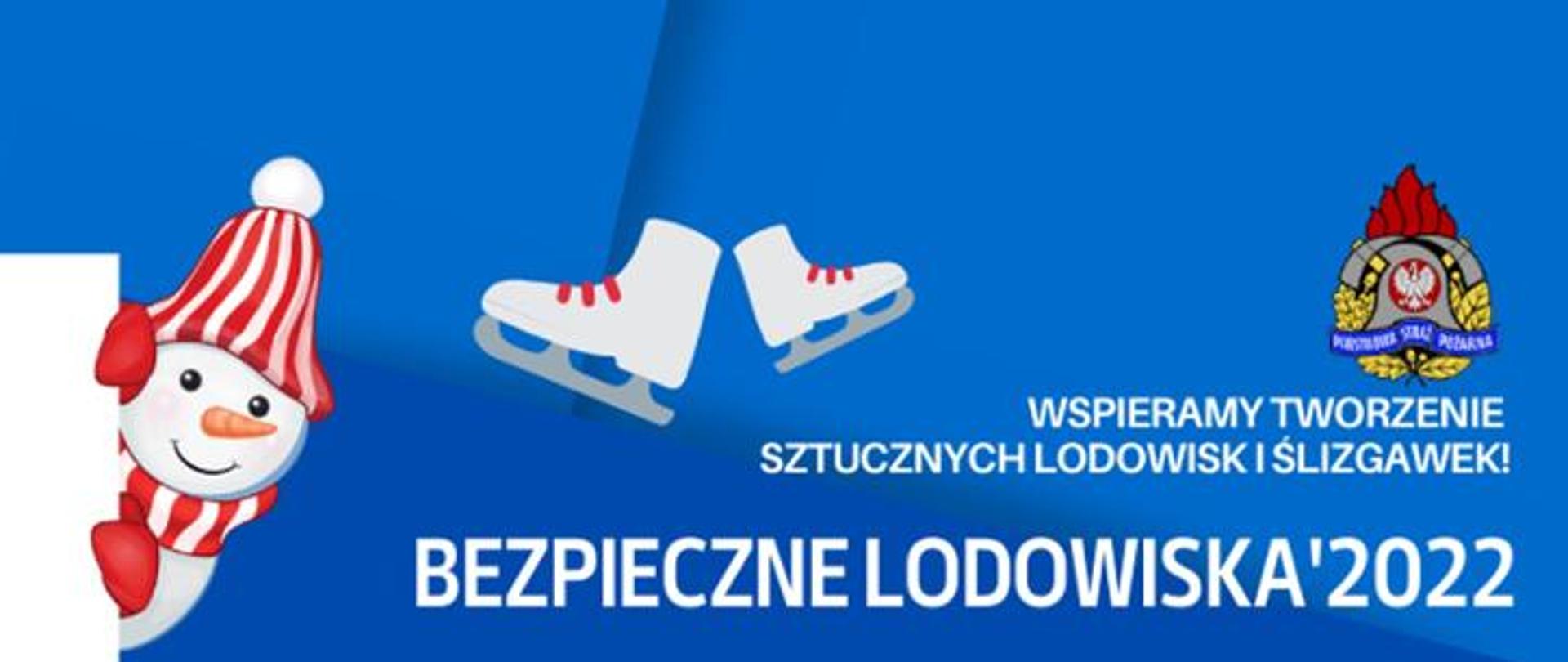 Baner nawiązujący do akcji bezpieczne lodowiska 2022. Na niebieskim tle łyżwy, bałwan oraz logo państwowej straży pożarnej. Pod obrazkami napis "wspieramy tworzenie sztucznych lodowiska i ślizgawek" oraz "bezpieczne lodowiska 2022"