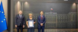 Małgorzata Garmulewicz, Naczelnik Urzędu Skarbowego w Kazimierzy Wielkiej z wyróżnieniem, w towarzystiwe Z-cy Szefa KAS Zbigniewa Stawickiego oraz dr Łukasza Bernatowicza Wiceprezesa BCC