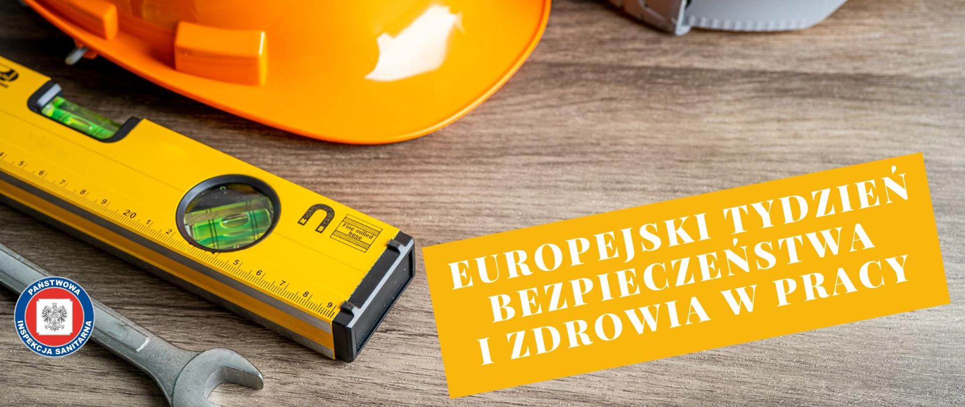 Kaski budowlane, poziomica oraz klucz do śrub