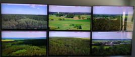 monitory pomieszczenie białe na monitorach widok lasów oraz pól 