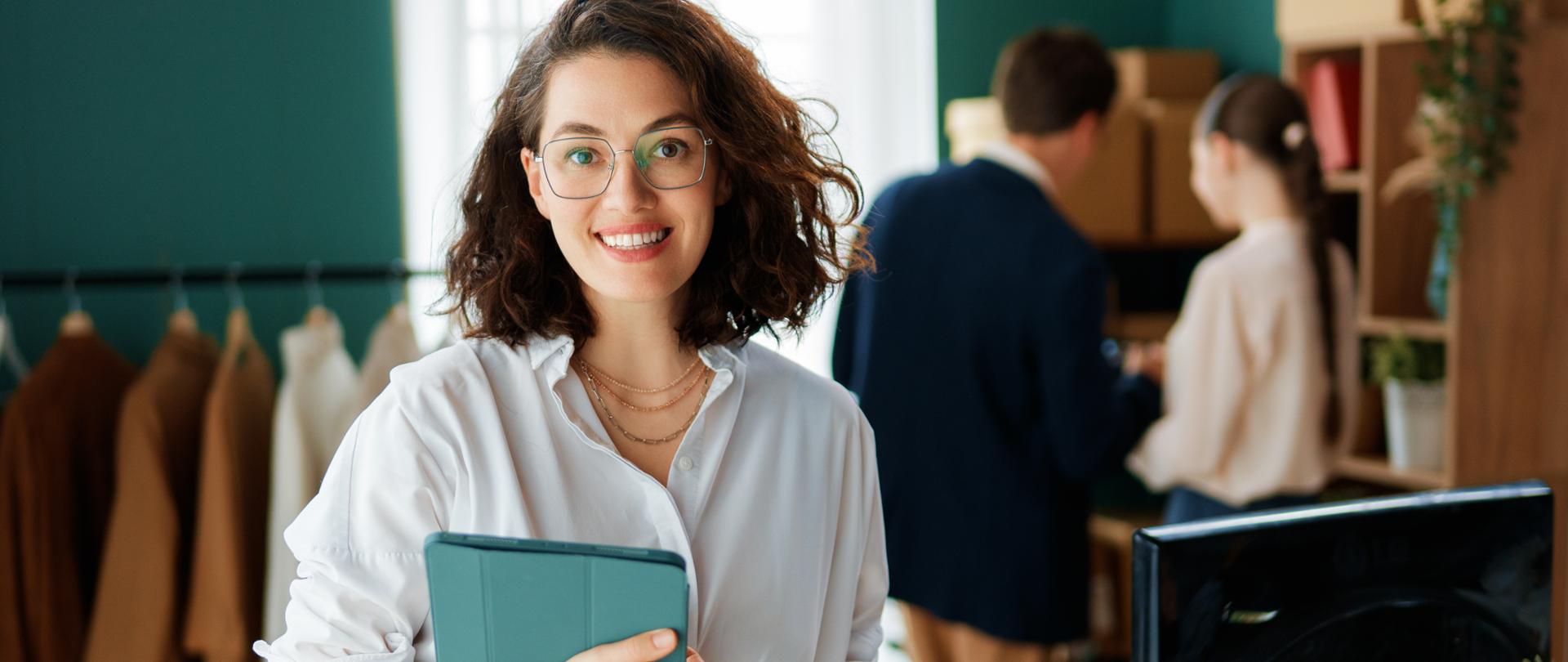 Young people fashion designers are working in studio.