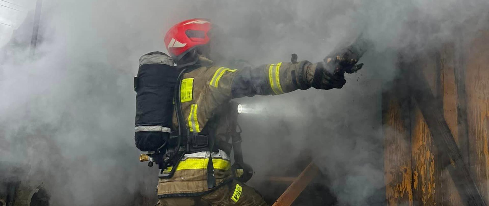 pożarze budynku w miejscowości Grójec