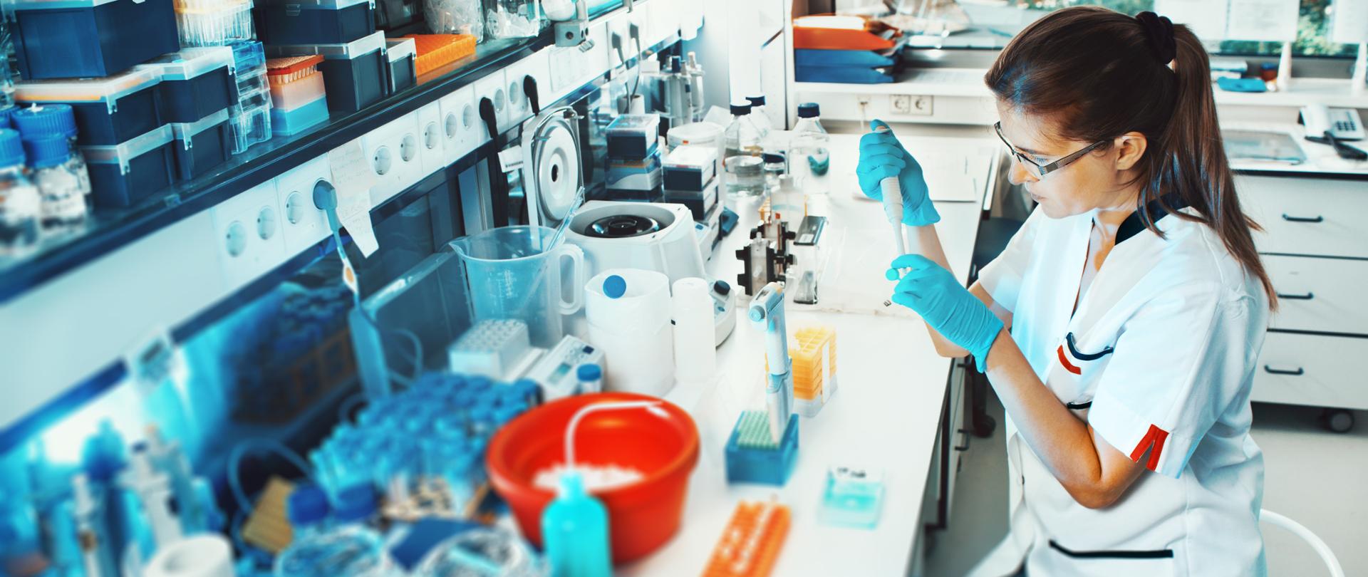 Young scientist works in modern biological lab