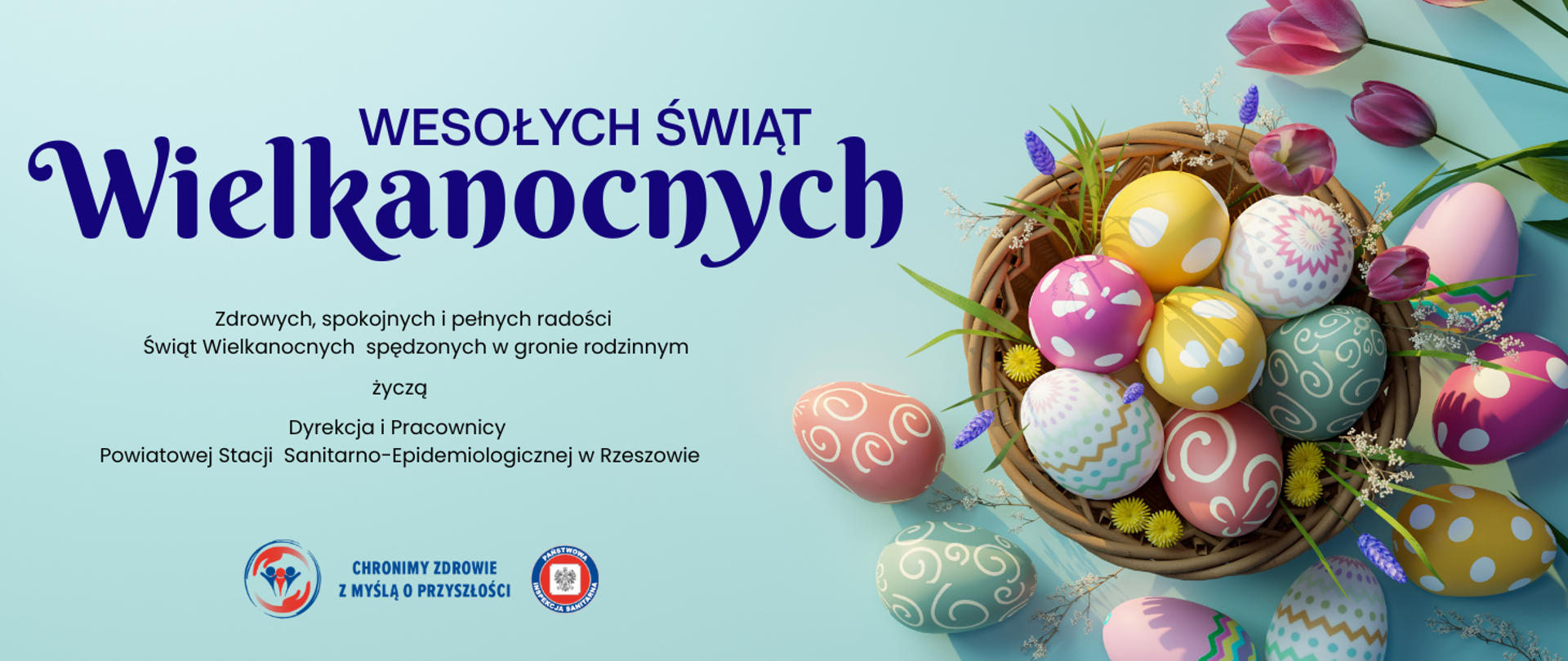Kartka z życzeniami świątecznymi. Koszyk z pisankami i tekst: Wesołych Świąt Wielkanocnych. Zdrowych, spokojnych i pełnych radości Świąt Wielkanocnych spędzonych w gronie rodzinnym życzą Dyrekcja i Pracownicy Powiatowej Stacji Sanitarno-Epidemiologicznej w Rzeszowie
