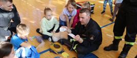 Prelekcje strażaków z zakresu kwalifikowanej pierwszej pomocy w Zespole Placówek Oświatowych – powiat kazimierski