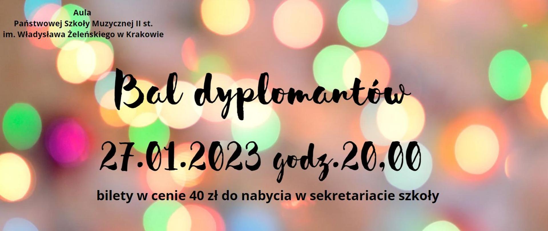na kolorowym papierze z motywem kolorowych świateł napis Bal dyplomantów 27.01.2023