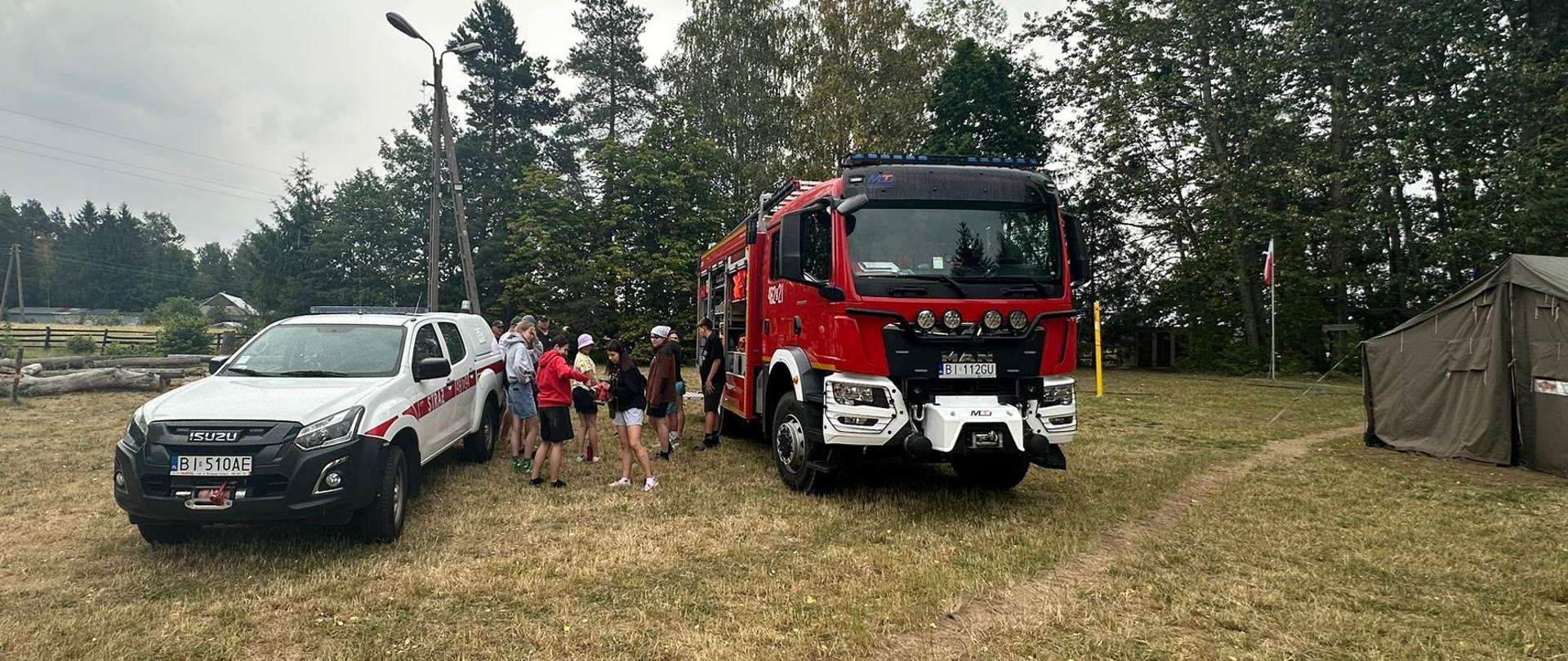 Wizyta strażaków w bazie harcerskiej "KAMIONEK" w Kamiennej Nowej