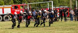 Zdjęcie przedstawia strażaków OSP z powiatu Leskiego podczas startu
w konkurencji „Ćwiczenie bojowe” na zawodach OSP w Baligrodzie
