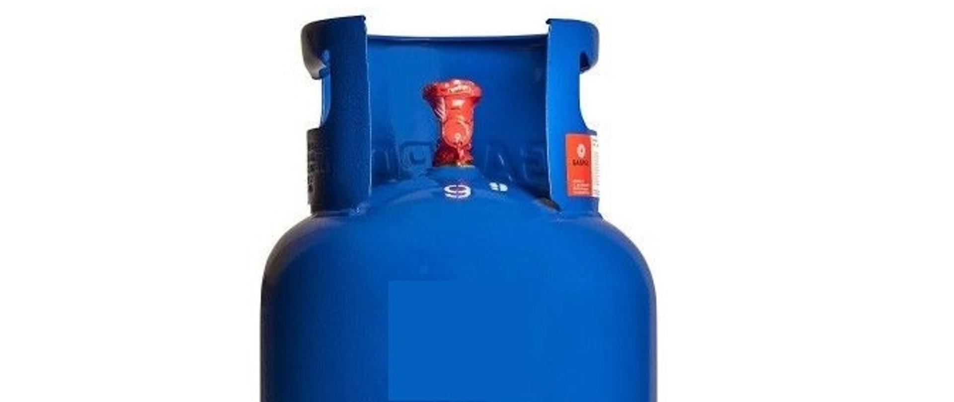 Zdjęcie przedstawiającą butle na gaz koloru niebieskiego na białym tle