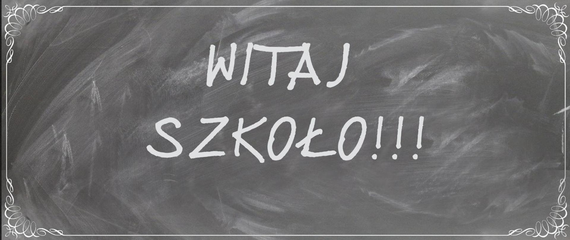 Napis "Witaj szkoło" na tablicy szkolnej