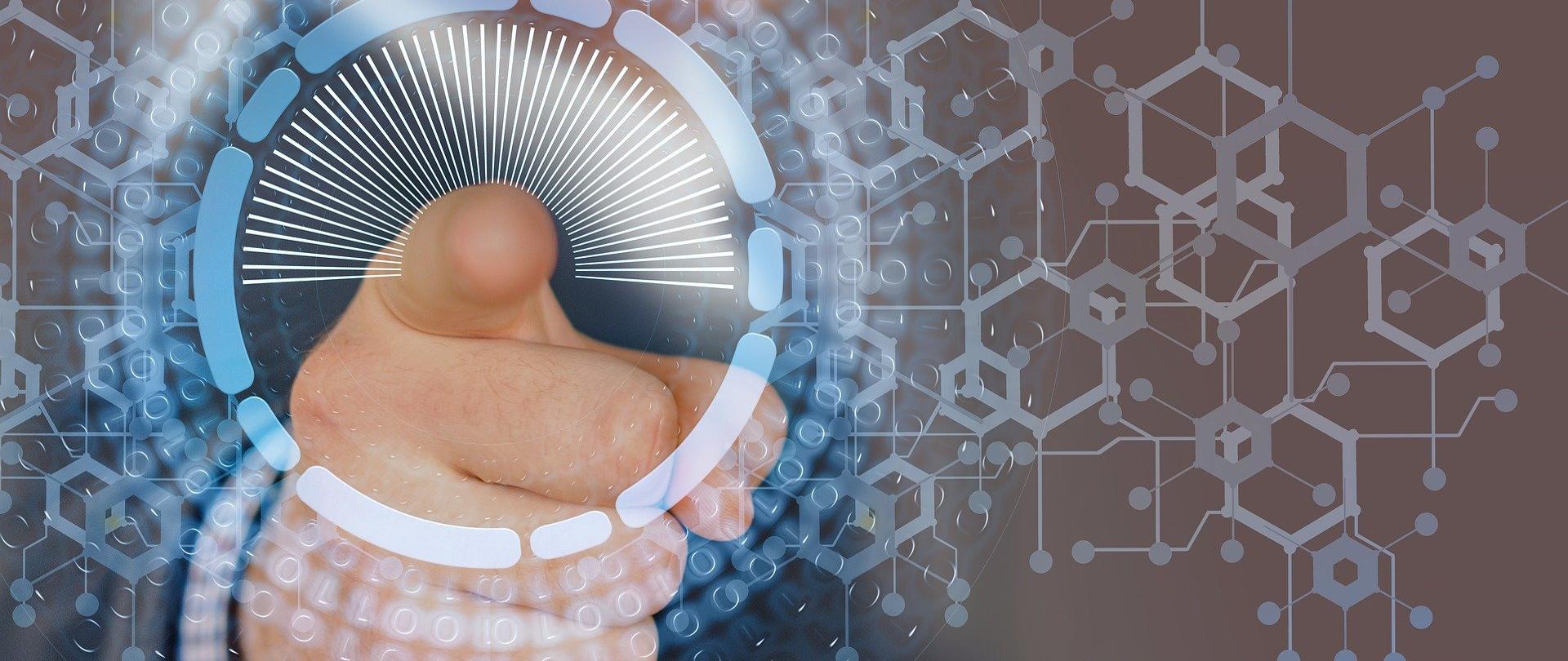 Palec wskazujący otoczony niebieskimi elementami symbolizującymi przepływ danych.