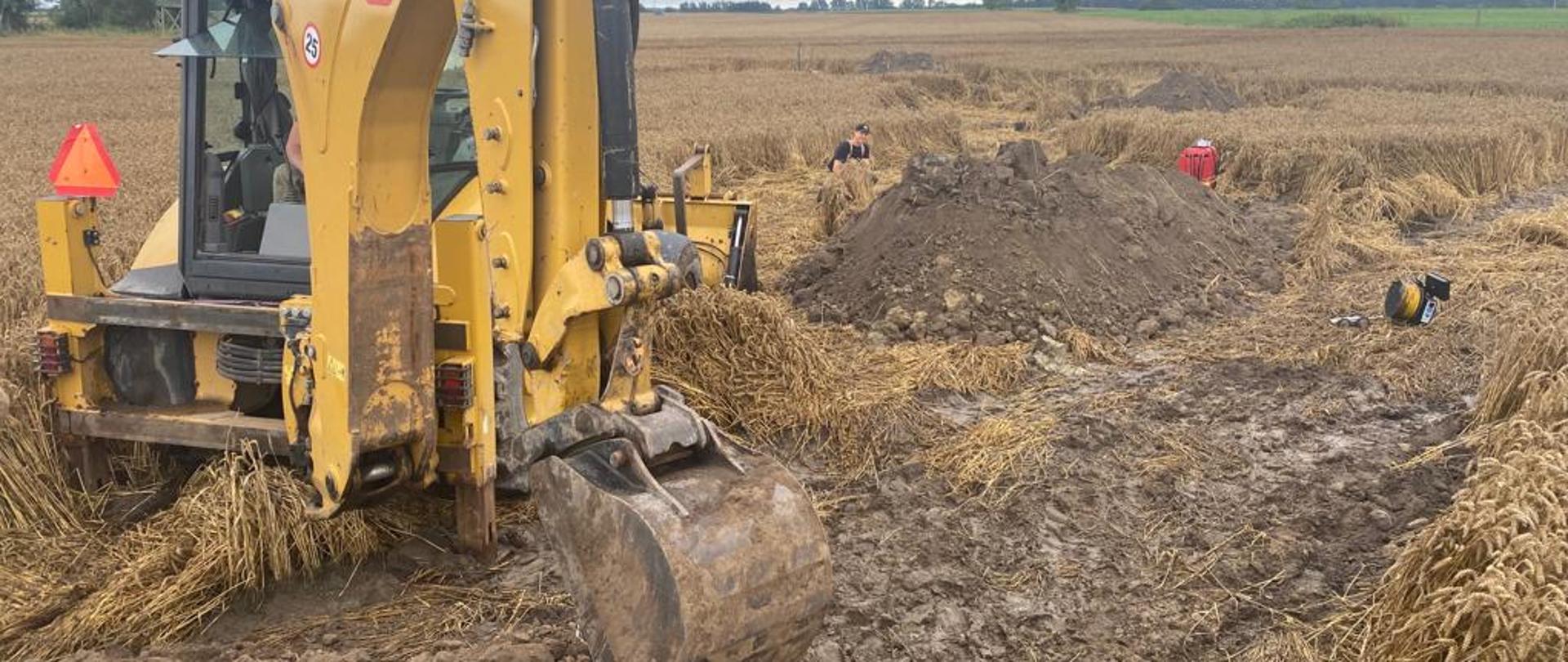 Koparka w czasie działań