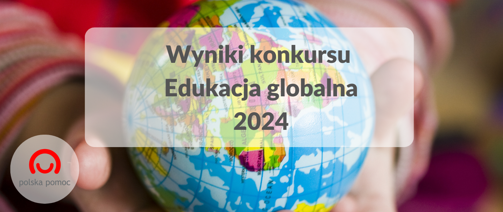 Hasło w ramce i logo Polskiej pomocy z globusem trzymanym przez ręce dziecka