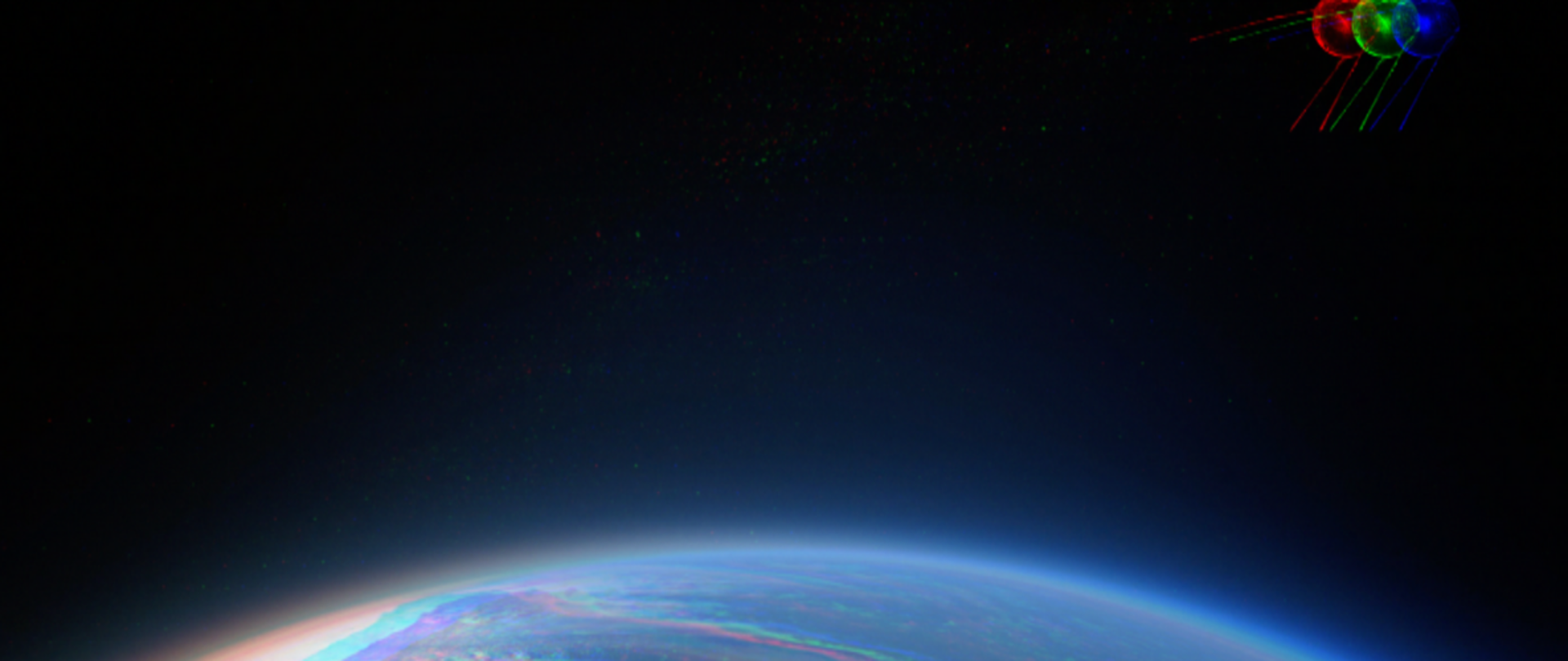 Element graficzny - planeta i 3 małe satelity