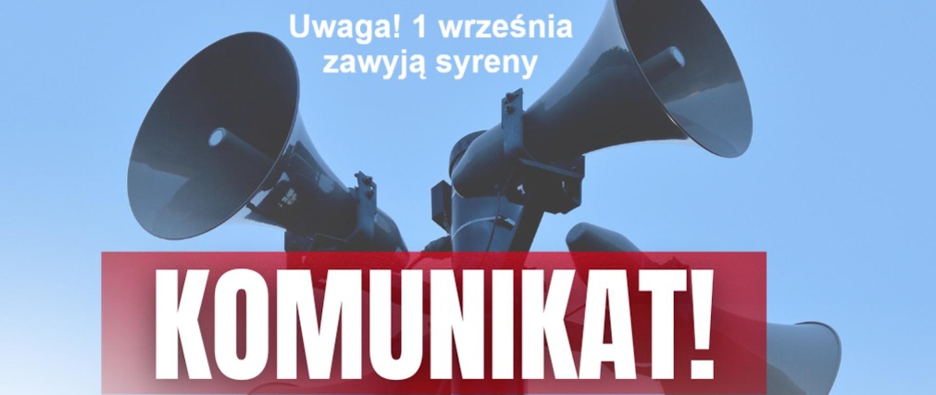 Obraz przedstawia syreny alarmowe na tle, których widnie biały napis: "KOMUNIKAT!" na czerwonym prostokątnym pasie oraz powyżej biały tekst: " Uwaga! 1 września zawyją syreny"