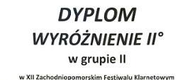 Zdjęcie przedstawia dyplom wyróżnienia dla ucznia. W tle jasnego plakatu znajduje się klarnet.