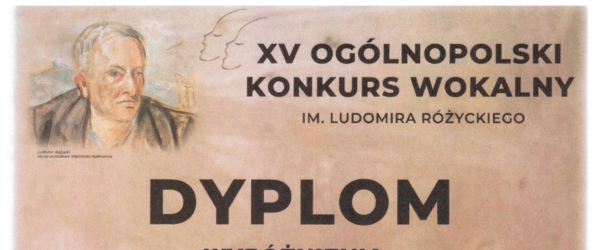 Na brązowym tle nazwa Konkursu "XV Ogólnopolski Konkurs Wokalny im. Ludomira Różyckiego" przyznany Łukaszowi Skowron za zdobycie wyróżnienia. Konkurs odbył się w dniach 27-29 marca 2025 r. 