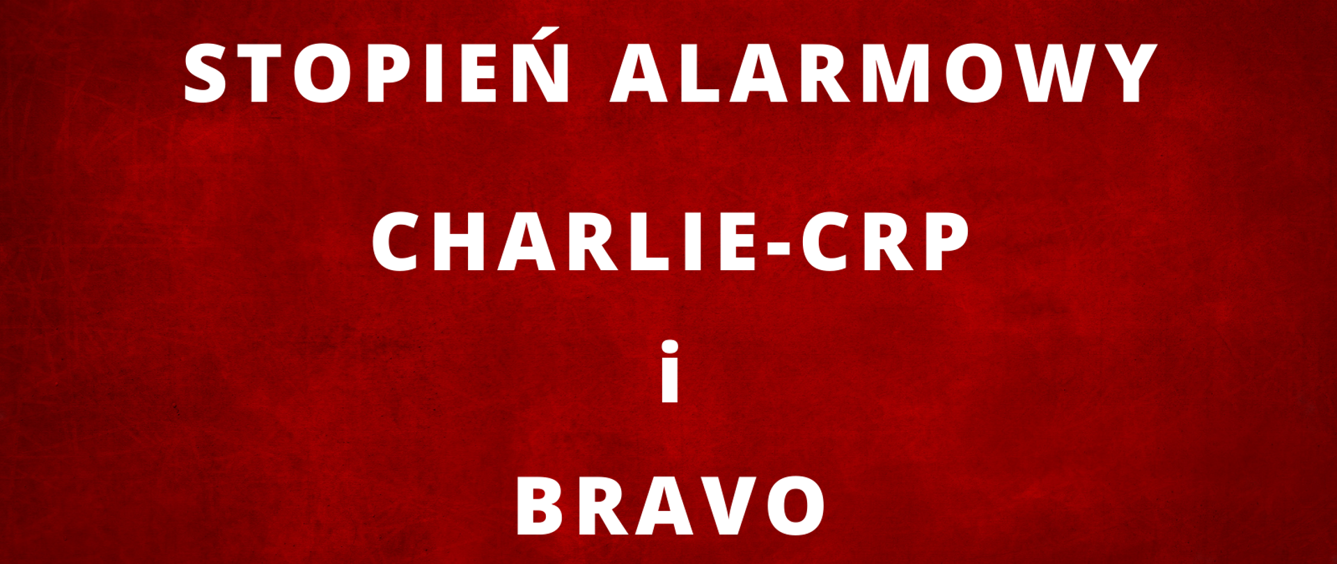 Baner z napisem: Stopień alarmowy CHARLIE-CRP i BRAVO 
