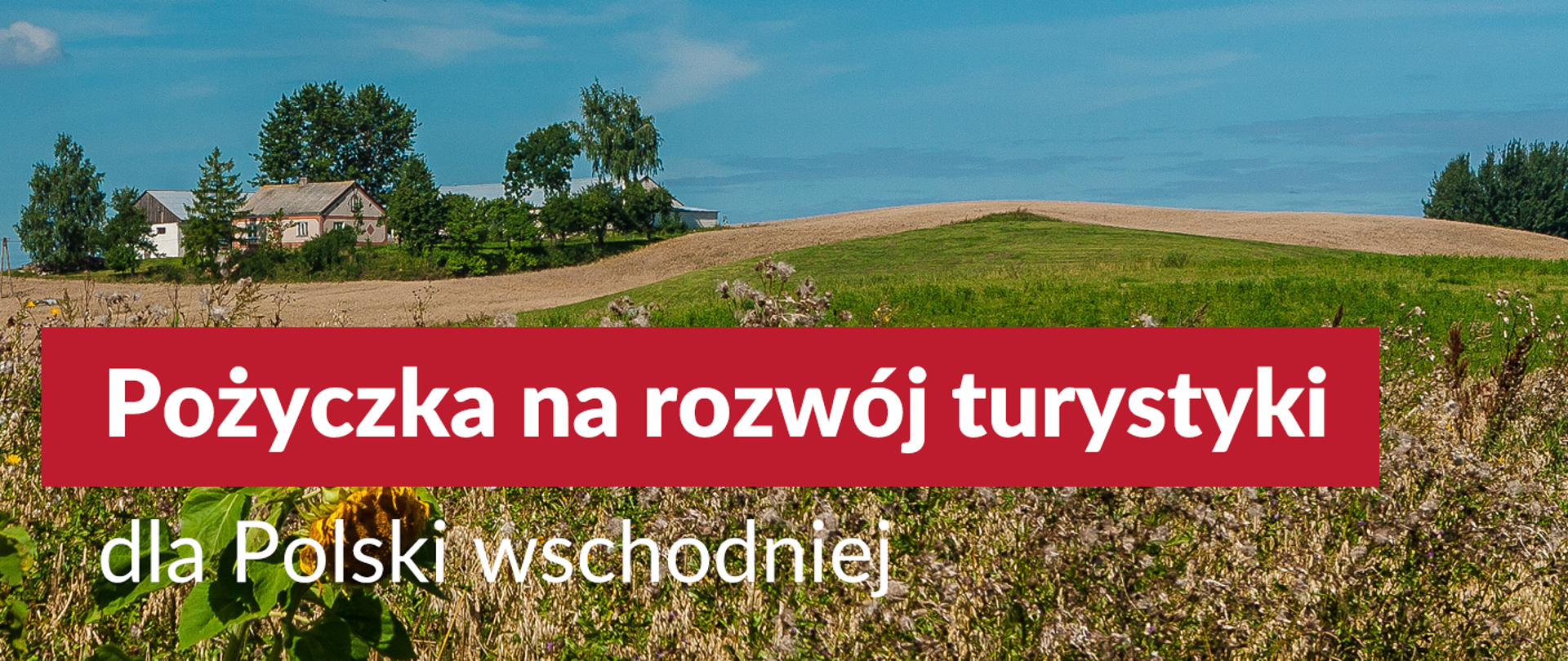 Preferencyjne pożyczki dla przedsiębiorców na rozwój turystyki w Polsce Wschodniej - napis na tle zdjęcia przedstawiającego pagórkowaty, letni pejzaż pól i domostw