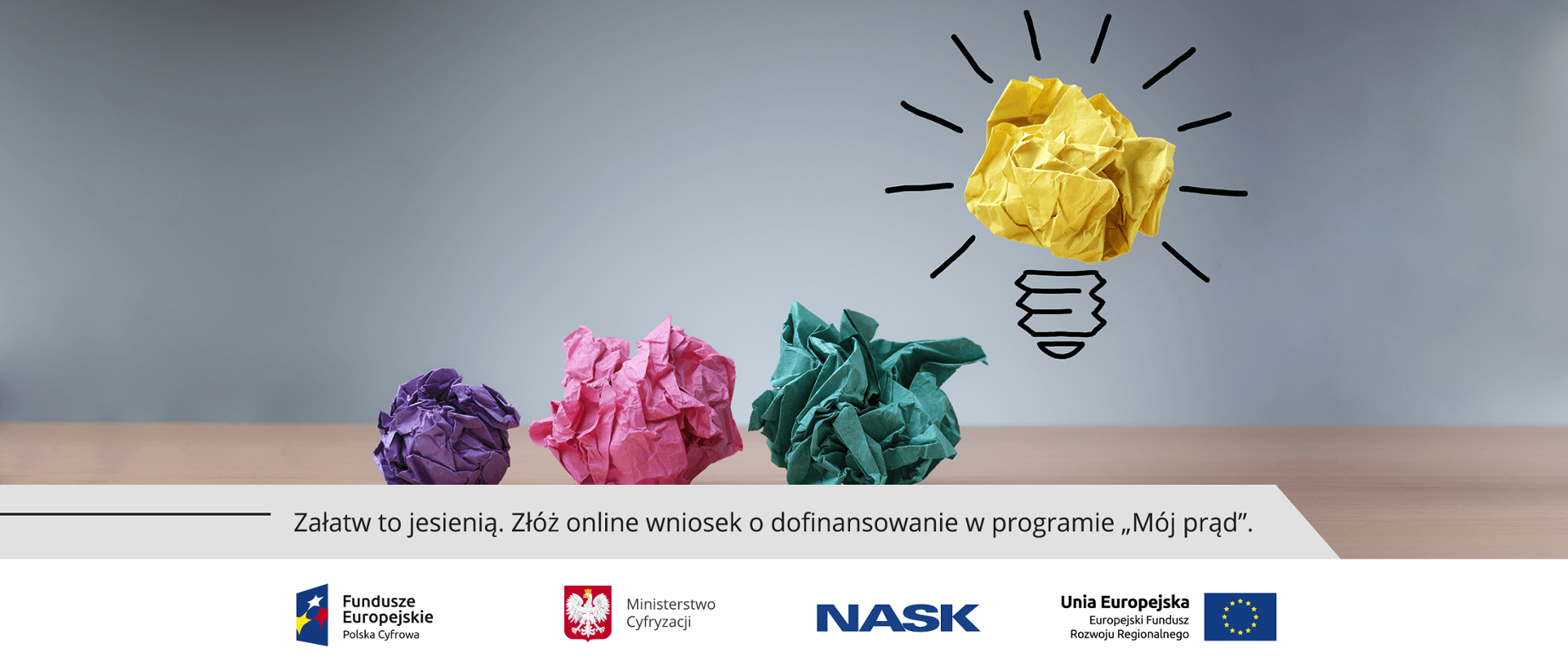 Grafika. Zgniecione kolorowe kartki papieru. Jeden z nich ułożony w kształt żarówki symbolizującej nową ideę. Poniżej napis: Załatw to jesienią. Złóż online wniosek o dofinansowanie w programie "Mój prąd".