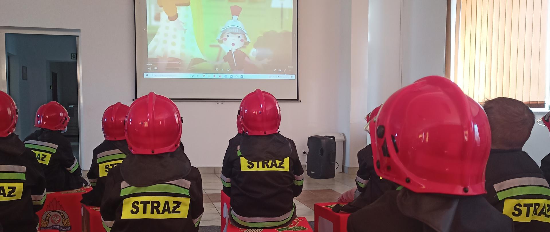 Zdjęcie przedstawia dzieci podczas zajęć w sali edukacyjnej 