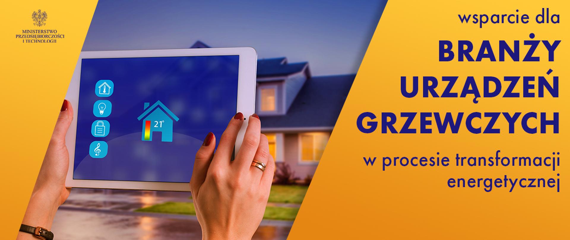 Zdjęcie tabletu z uruchomioną aplikacją do sterowania temperaturą ogrzewania. W tle dom. Z boku napis "Wsparcie dla branży urządzeń grzewczych w procesie transformacji energetycznej".
