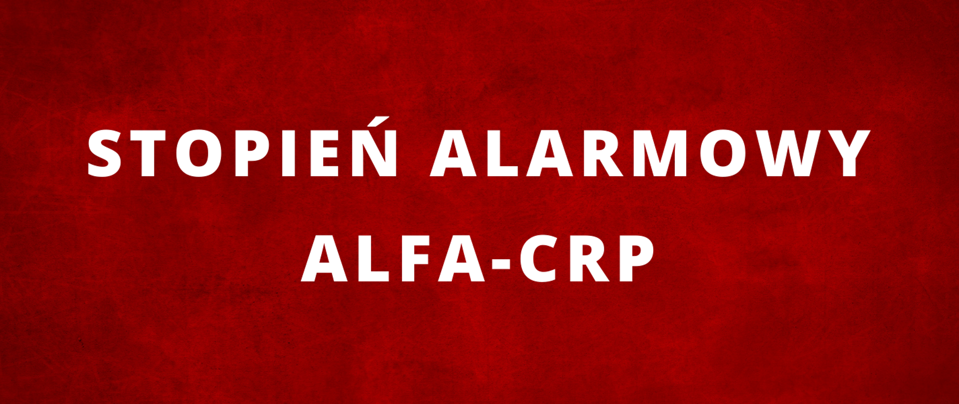 Na zdjęciu widać biały napis na czerwonym tle stopień alarmowy ALFA-CRP