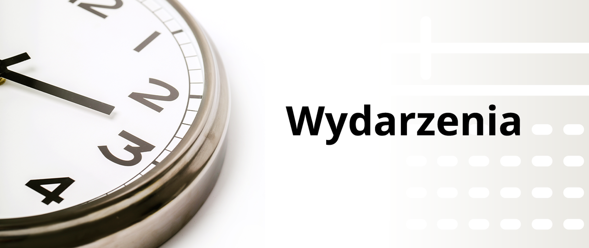 Na zdjęciu widać fragment zegara oraz napis Wydarzenia