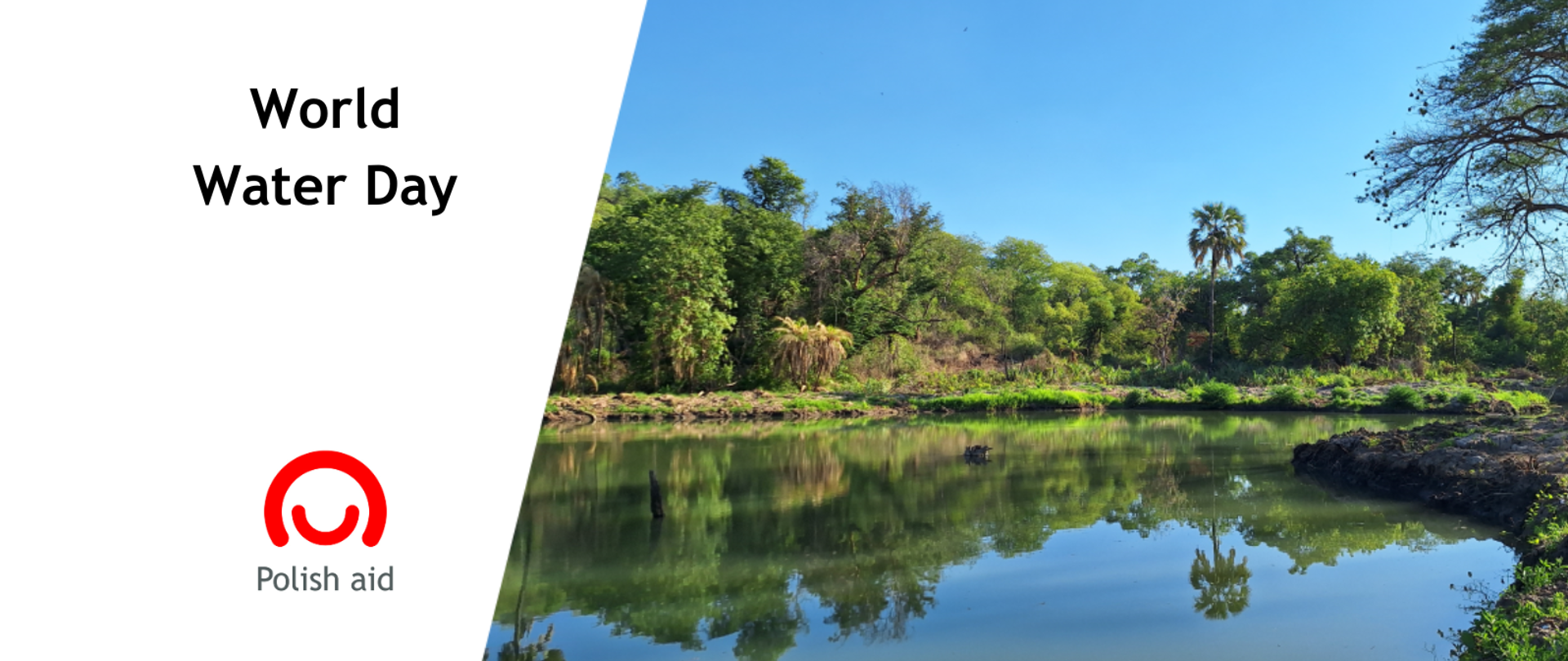 12. A sunset over a calm lake with vibrant orange and pink hues reflecting on the water