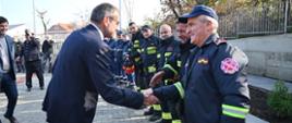 Chargé d'affaires of the Republic of Poland in Albania Wojciech Unolt greets firefighters.