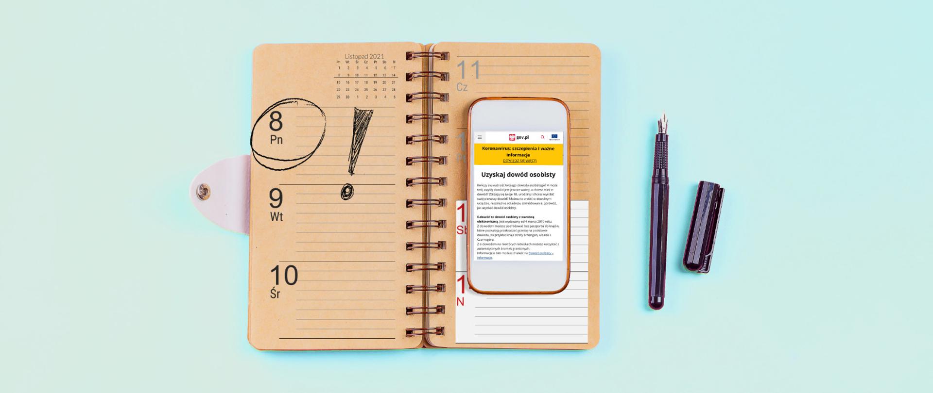 Zdjęcie książkowego kalendarza z zaznaczoną datą 8 listopada. Na kalendarzu leży smartfon, na ekranie którego widać stronę GOV.pl z informacją, jak uzyskać dowód osobisty.