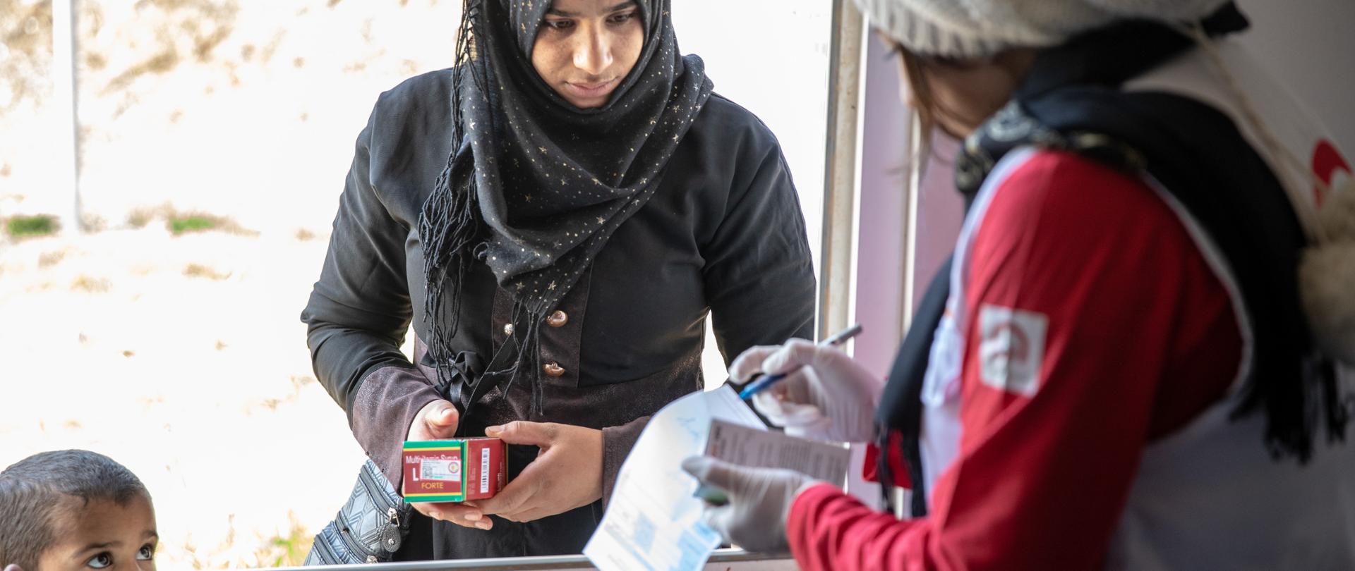 kobieta z dzieckiem podczas wizyty lekarskiej