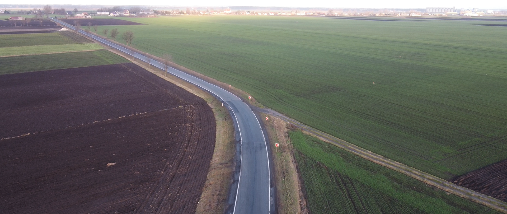 DK62 w miejscowości Sławsk Wielki. Widok na pola, którymi zostanie poprowadzona obwodnica wsi w ramach rozbudowy